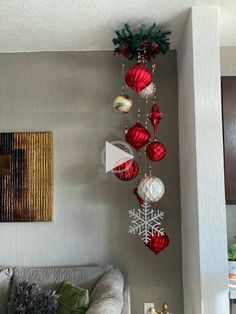 a living room with ornaments hanging from the ceiling