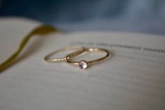 STUNNING handmade Natural Rainbow Moonstone ring set ✨ * Listing covers both the moonstone ring and twisted band.  Beautiful 3mm Natural Rainbow Moonstone gemstone ✨ * all stones are natural, therefore color & flash will very for each stone.  Rainbow moonstone meaning is about deep spirituality and connection with ones inner self. Moonstone helps the wearer embark on a journey of introspection and self-awareness. A beautiful minimalist piece to have in ones collection✨ Perfect for stacking or wearing alone! Material: 14/20 (karat/purity) gold fill OR 925 Sterling Silver  Band Thickness: 1.2mm Adjustable 14k Gold Minimalist Moonstone Ring, Adjustable Minimalist 14k Gold Moonstone Ring, Minimalist Si Clarity Moonstone Wedding Ring, Minimalist Everyday Moonstone Ring, Dainty Moonstone Stackable Rings For Gift, Dainty Moonstone Stackable Rings As Gift, Delicate 14k Gold Stackable Moonstone Ring, Minimalist Handmade Gold Moonstone Ring, Dainty Adjustable Moonstone Ring For Everyday