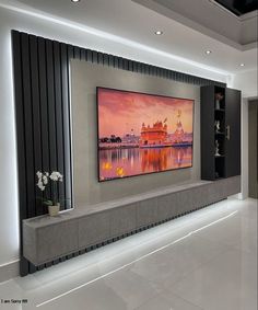 a large flat screen tv mounted to the side of a wall