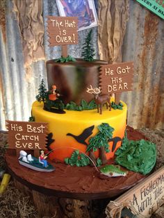 a birthday cake decorated with an image of the hunt is over and his best catch ever