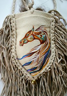 Native Horse Painting Deerskin Leather Medicine Bag Totem Amulet Original Jill Claire. $80.00, via Etsy. Native Horse, Thick Fringe, Round Braid, Buckskin Horse, Leather Medicine Bag, Paint Horse, Medicine Bag, Native American Beadwork, Nativity Crafts