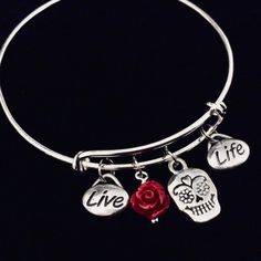 To Personalize…Use this link if you would like to add Birthstones to this bracelet ~ https://www.etsy.com/listing/774404837Use this Link to add an Initial Charm to this bracelet ~ https://www.etsy.com/listing/760532344Expandable and Completely Adjustable. Stainless Steel Split rings attach charms to bangle making them almost possible to come off. No more lost charms!!!SIZES AVAILABLE Kids Size fits 4- 8 yrs.Teen Size fits 8-16 yrs.Adult Size fits ~ 16 yrs. and OverMy bangles are expandable ensur Kids Charm Bracelet, Rose Live, Kids Bangles, Sugar Skull Halloween, Stackable Bangles, Skull Halloween, Halloween Charms, Silver Plated Bracelet, Bangles Making