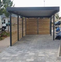 a covered parking lot with cars parked in it