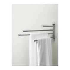 the towel rack has two towels hanging from it's sides and is next to a white wall