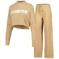 This Clemson Tigers set is the perfect winter outfit or cozy lounge apparel. It includes a cropped sweatshirt with roomy raglan sleeves and sweatpants decorated with striking Clemson Tigers graphics on each piece. A midweight design on both pieces creates a soft, warm and comfortable feel from top to bottom.This Clemson Tigers set is the perfect winter outfit or cozy lounge apparel. It includes a cropped sweatshirt with roomy raglan sleeves and sweatpants decorated with striking Clemson Tigers g Collegiate Relaxed Fit Sweats For Loungewear, Collegiate Winter Sweats For Loungewear, Perfect Winter Outfit, Cozy Lounge, Vanilla Girl, Clemson Tigers, Sweatpants Set, Cropped Sweatshirt, Crop Sweatshirt