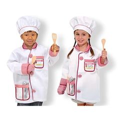 two children in chef outfits holding utensils