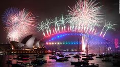 fireworks light up the sky over sydney harbour during new year's eve celebrations in australia