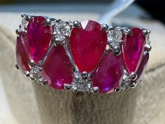 A Pigeon Blood color natural ruby ring featuring a 2.91-carat ruby and 0.10 carats of natural diamonds in an 18k gold setting sounds like an exquisite and rare piece. Pigeon blood rubies, prized for their intense red hue, are among the most valuable rubies in the world. Coupled with natural diamonds and set in 18k gold, this ring would make for an exceptional luxury offering. Natural Ruby Ring, Ruby Ring, Natural Ruby, Wedding Rings Engagement, Wedding Engagement, Natural Diamonds, Wedding Bands, Ruby, 18k Gold