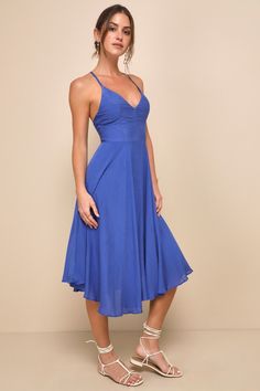 From the island of Mykonos to your besties back-yard party the Lulus Troulos Royal Blue Lace-Up Midi Dress is sure to make an appearance! This breezy, midi dress is shaped from gauzy, woven rayon that sweeps over the V-neckline, princess-seamed bodice, and fitted waist. Skinny straps cross at back and then weave into a chic, lace-up back. Full skater skirt falls to a midi length. Hidden back zipper/clasp. Fit: This garment fits true to size. Length: Knee to mid-calf length. Size medium measures V-neck Beachwear Midi Dress For Beach Party, Chic Spaghetti Strap Beach Dress For Party, Fitted V-neck Beach Dress For Summer Parties, Blue Spaghetti Strap Halter Dress For Spring, Flowy V-neck Backless Dress For Beach, Casual Beach Dress With Spaghetti Straps For Party, Party-ready Backless Beach Sundress, Backless Beach Dress For Spring Party, Blue Backless Halter Dress For The Beach