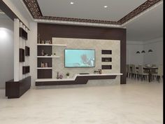 a living room filled with furniture and a flat screen tv mounted on a wall next to a dining room table