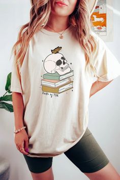 Don't ask me about my TBR... » Featuring a skull on a stack of books with a butterfly, and the phrase "'Death by TBR." A great gift for book and reading lovers! Or to TREAT YO SELF. Country Concert Outfits, Fall Apparel, Chat Halloween, Toy Story Shirt, Boho Tees, Comfort Colors Tshirt, Cowgirl Shirts, Skeleton Shirt, Pumpkin Shirt