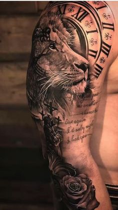 a man's half sleeve with a lion and roses on the left side of his arm