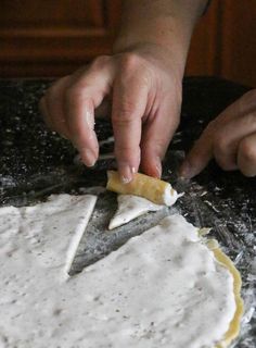 a person is making food on a table