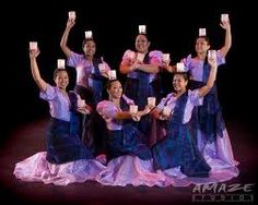 a group of women holding mugs in their hands