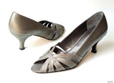 Prevata Really great 'Vaness' shoes done in pewter lizard leather with cut-outs details. * Open toe * Padded leather insole * Leather sole * 2.75 inches heel Brand new in original box. Made in Italy. 100% authentic. Retail $340. Very pretty! Gray Open Toe Heels For Evening, Gray Heels For Summer Evenings, Mid Size, Heels Shoes, Cut Outs, Open Toe, Kitten Heels, Original Box, Shoes Heels