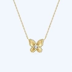 A delicate floating butterfly with a single cz center stone on a delicate chain. Gold plated sterling silver Adjustable length 16" with 2" extender Butterfly is .5" wide Dainty Diamond Necklace With Butterfly Charm, Elegant Butterfly Diamond Necklace As Gift, Elegant Butterfly Diamond Necklace Gift, Delicate Butterfly Cubic Zirconia Jewelry, Elegant Butterfly-shaped Diamond Necklace Gift, Delicate Butterfly-shaped Cubic Zirconia Jewelry, Delicate Butterfly Jewelry With Cubic Zirconia, Delicate Butterfly-shaped Jewelry With Cubic Zirconia, Formal Butterfly Diamond Necklace