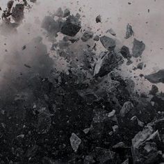 a large amount of rocks and debris in the air