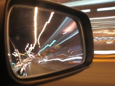 the rear view mirror on a car is blurry