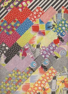 a colorful quilt with lots of different patterns