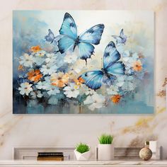 an abstract painting of blue butterflies and white flowers on a marble wall above a fireplace mantel