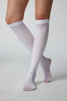 Essential knee highs in the softest sheer knit. Versatile tall sock silhouette with a sheer sock finish. Features Classic sheer knee high socks Barely-there sheer socks Tall knee high silhouette Ultra-soft fine knit Content + Care 96% Nylon, 4% spandex Hand wash Imported Size + Fit Knee high sock length Fits US women’s shoe size 6–10 | Classic Sheer Knee High Sock in White, Women's at Urban Outfitters White Knee Socks, Beach Socks, Socks Aesthetic, White Stockings, Sheer Socks, Bow Decor, Lace Socks, Over The Knee Socks, Preppy Look