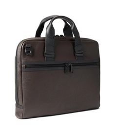 Travel carrying all your essential stuff in the high utility and trendy Tumi® Academy Brief..Durable and highly functional brief crafted using a combination of Ballistic nylon, leather, and PU..Includes the Tumi Tracer®, an exclusive program that helps you reunite with your lost or stolen items..Removable shoulder strap for added practicality..Zippered top closure..Dedicated laptop and tablet compartments..Luggage tag & key clip included..Three exterior pockets including one open pocket on the b Brown Laptop Bag For Work With Zipper Closure, Brown Laptop Bag With Zipper For Work, Leather Briefcase With Zipper For Work, Functional Leather Laptop Bag For Office, Functional Leather Briefcase For Business Trips, Functional Leather Briefcase For Work, Modern Briefcase With Zipper For Work, Versatile Business Briefcase With Zipper Closure, Modern Brown Briefcase With Zipper Closure