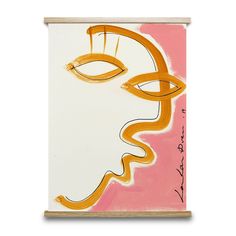 an abstract painting with orange and pink lines on the face, against a white background