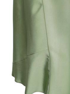 Slip skirt with sideways cut Elastic waist Colour: green Composition: 100% viscose Chic Flowy Green Skirt, Chic Green Viscose Bottoms, Elegant Green Mini Skirt For Summer, Chic Green Knee-length Skirt, Elegant Green Flared Mini Skirt, Green Silk Lined Skirt, Green Silk Bottoms For Summer, Green Asymmetrical Relaxed Skirt, Green Relaxed Knee-length Mini Skirt