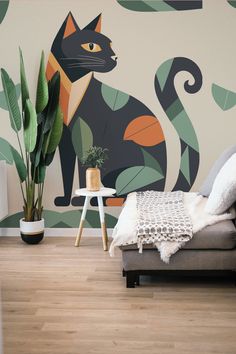 a living room with a couch, chair and wall mural