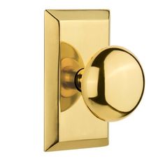 an image of a golden door handle on a white background