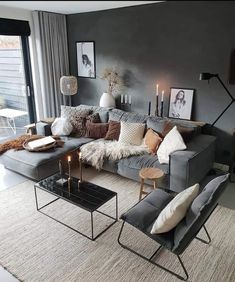 a living room filled with lots of furniture and decor