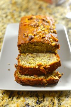 two slices of banana nut bread on a plate with the words starbucks's banana nut bread