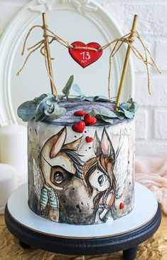 a decorated cake with an animal theme on it