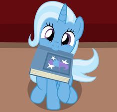 the blue pony is holding a book with stars on it's face and eyes