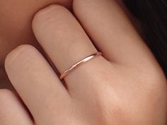 "1.5mm Simple Thin Plain Wedding Band, 14k Solid Gold Smooth Plain Band, Thin Dainty Band, Stackable Gold Band Features (US Size 7) - Made to order. - Materials: Solid Gold - Gold KT: Available in 14K - Custom Gold Color: Rose Gold, Yellow Gold, White Gold - Ring Width: 1.5 mm (Approximately) - Ring Height: 0.70 (Approximately) - FREE Shipping! - SKU: R195 For Ready-to-ship items search here, https://etsy.me/39BDvMS Hi and thank you very much for visiting my shop! Please feel free to ask any que Plain Wedding Band, Ring Rosegold, Dainty Band, Simple Band, Stackable Bands, Vintage Wedding Band, Rose Gold Wedding Bands, Plain Bands, Promise Rings For Her