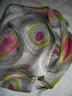 A bold colorful modern abstract design with black resist circles painted with magenta and chartreuse. Hand painted silk scarf 11 inches x 60 inches     28 cm x 152 cm A fun addition to any wardrobe for any occasion when you need a splash of color. This scarf is completely unique. A wearable art piece. Made of 100% Habotai silk with hand rolled edges.  Lightweight and breezy with a light sheen and soft luxurious texture. Beautifully drapes around your neck. This scarf is made to order. Due to the Silk Scarf Design, Habotai Silk, Batik Art, Abstract Hand, Silk Scarf Painting, Silk Set, Hand Painted Silk Scarf, Painted Silk, Hand Painted Silk