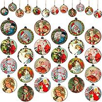 an assortment of christmas ornaments hanging from strings