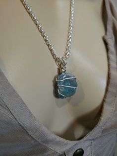 "This gorgeous and huge AAA quality genuine raw green Fluorite gemstone necklace is absolutely unique. It is wrapped in Sterling Silver and hung on an silver plated steel chain, you can pick the length of approximately 22\". What a statement piece! This is a very unique and original piece of jewelry, there will never be another just like it!  Makes a great gift for someone you love or for yourself. A great gift of the sea for any ocean enthusiast, beach jewelry lover, nature lover, and earthy jewelry fan. great gift for her for Mexico and Caribbean beach lovers.  ★ ABOUT OUR SEA GLASS AND STONES ★  Visit our shop for more information about where we find our sea glass and stones, as well as our ethical and eco-friendly supply chain." Nature-inspired Raw Stone Jewelry For Healing, Nature-inspired Raw Stone Healing Jewelry, Artisan Silver Necklace With Raw Stone, Bohemian Sterling Silver Jewelry With Raw Stone, Bohemian Silver Necklace With Raw Stone, Bohemian Silver Plated Wire Necklace Gift, Spiritual Gemstone Jewelry With Silver Plated Wire, Bohemian Pendant Jewelry In Silver Plated Wire, Nature-inspired Jewelry With Raw Stone For Gift