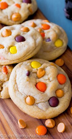 white chocolate chip cookies with candy corn on a cutting board