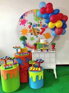 a birthday party with balloons and decorations