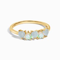 Introducing the ring that will capture your heart at first glance! Adorned with five charming heart-shaped stones, this piece features a captivating combination of Aquamarine and Opal.
Aquamarine's calming blue brings courage and clarity, boosting your confidence when you need it most. Opal dazzles with its iridescent colors, encouraging positivity and gratitude.
This ring is more than just a stunning accessory; it's a powerful symbol of well-being. Let it fill your life with courage, positivity Crush On You, Moon Magic, Aqua Marine, Opal Stone, Pink Gifts, Opal Ring, Luxe Gifts, White Sapphire, Opal Rings