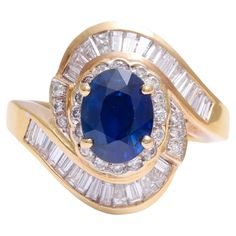 Brand New 18 kt Yellow Gold Ring with 1.47 ct. Sapphire 1 ct. Brilliant & Baguette Diamonds Diamonds: Baguette cut diamonds together 0.85 ct. Brilliant cut diamonds together 0.15 ct. Together 1 ct. diamonds Sapphire: Oval cut sapphire 1.47 ct. Material: 18 kt yellow gold Ring size: 53 EU / 6.5 US ( Ring size can be changed for free ) Total weight: 6.6 grams / 0,230 oz / 4.20 dwt Ring will be presented in a new jewellery box European Modern, Baguette Diamonds, Baguette Cut Diamond, Baguette Cut, Yellow Gold Ring, Baguette Diamond, Brilliant Cut Diamond, Yellow Gold Rings, Oval Cut