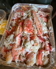 lobster salad in a glass dish on a table