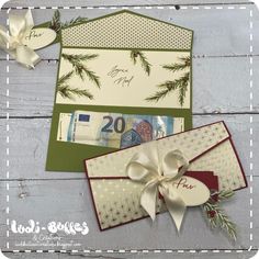 two christmas cards with bows on them