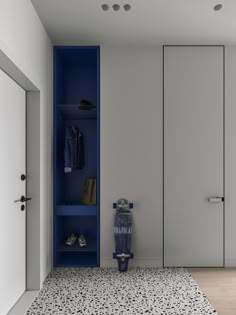 a blue and white room with an open closet