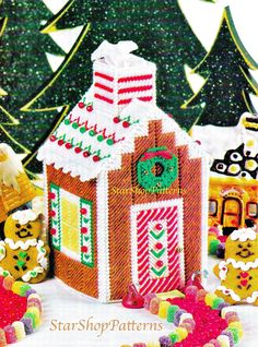 a gingerbread house is decorated with candy canes