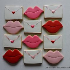 cookies decorated like envelopes with lipstick on them