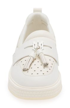 Combining the comfort of a sneaker with the polish of a loafer, this tassel-trimmed leather shoe with boat lacing is set in a textured cupsole. Removable insole Leather upper/textile lining/rubber sole Imported Designer Shoes White Leather Loafers With Tassels, White Leather Tassel Loafers For Spring, White Leather Casual Tassel Loafers, Casual White Leather Tassel Loafers, Luxury Low-top Loafers With Brogue Detailing, White Low-top Loafers With Textured Sole, White Leather Tassel Loafers With Rubber Sole, Casual Low-top Tassel Loafers With Leather Sole, White Round Toe Casual Tassel Loafers