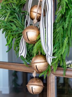 Four round brass finished bells hung from jute rope, our Theo Bells are a versatile holiday styling-piece. Hang from a wreath on your front door, or with garland on a mantel or staircase. We even love using bells as objects on a stack of books or in a pretty bowl. *Stock on our Holiday Collection is limited.*Holiday items are eligible for returns until December 15th. Christmas Decor Inspiration, Christmas Mantel Decorations, Christmas Mantle, Natural Christmas, Christmas Mantels, Farmhouse Christmas Decor, Merry Little Christmas, Holiday Items, Christmas Love