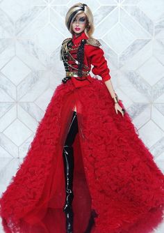 a barbie doll wearing a red dress and black boots with her hands on her hips